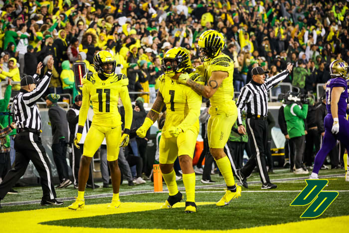 Noah Sewell celebrates a big play against the Washington Huskies at Autzen Stadium in Eugene.